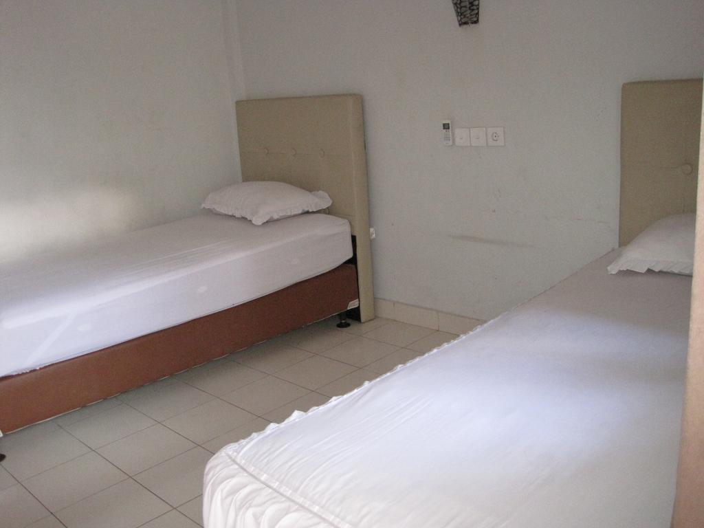 Taman Mekar Beach Inn Kuta  Phòng bức ảnh